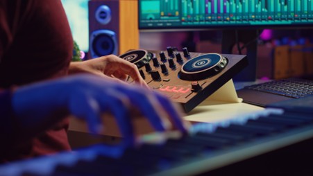 someone mixing music